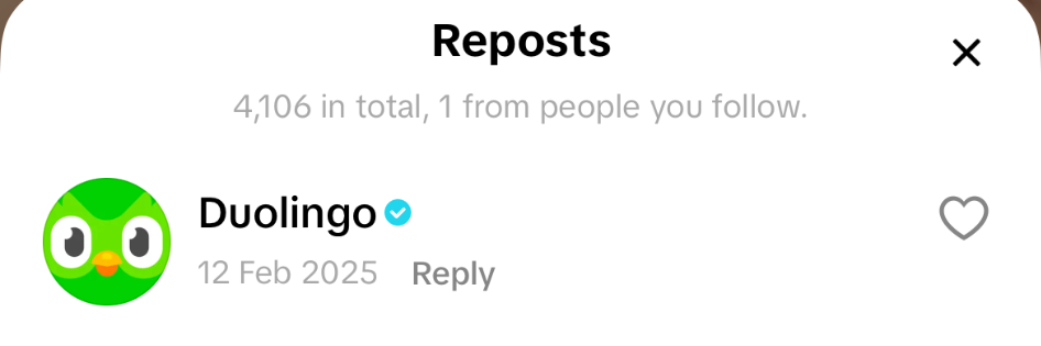 Verified Duolingo account shown reposting The Warwick Tab TikTok